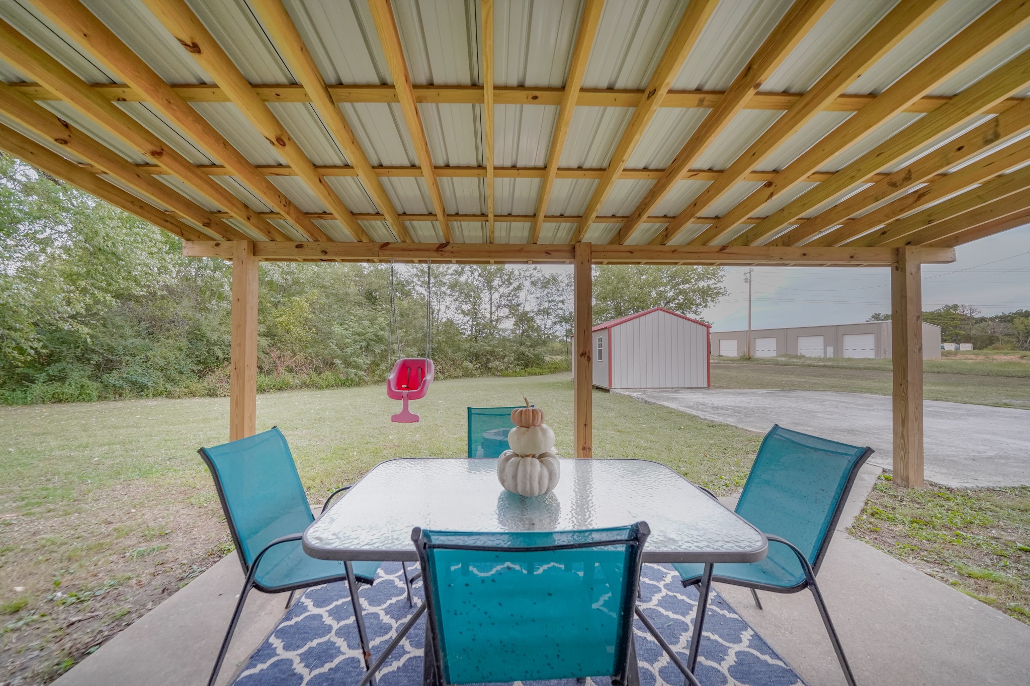 258 East Prospect Road Fayetteville, TN 37334 - Photo 10 of 26 a view of a patio with a table and chairs under an umbrella