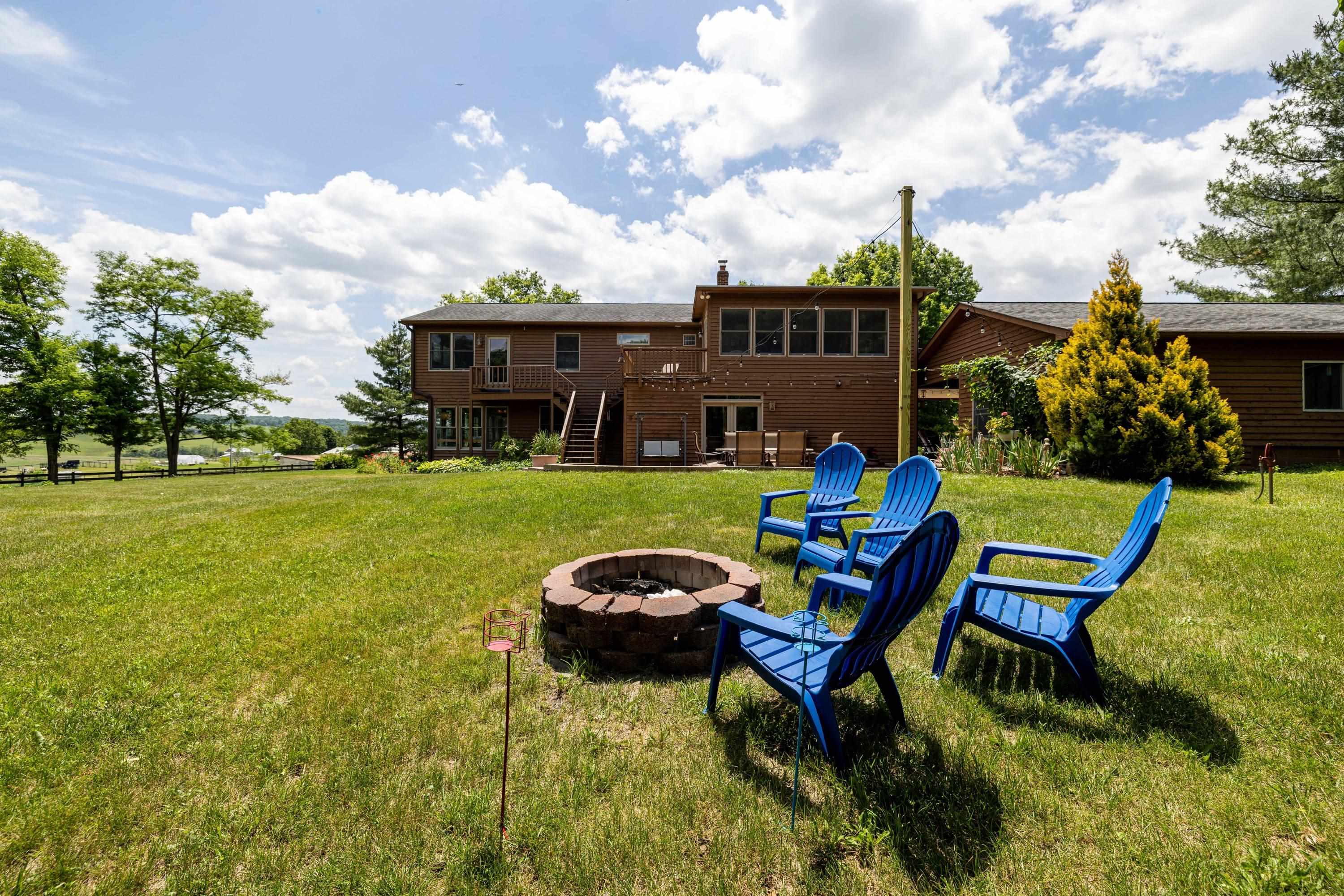 3980 Greenmount Road Harrisonburg, VA 22802 - Photo 54 of 75 The backyard space offers landscaping, a level backyard with a fence, and stunning view surrounding the home!