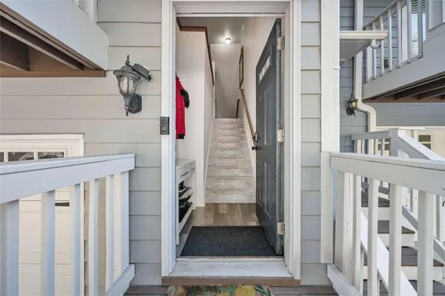 a view of a dining area with furniture and wooden floor