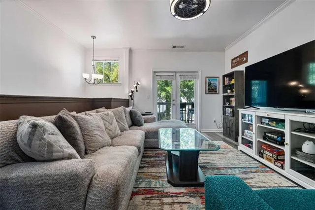 a view of balcony with a table and chairs