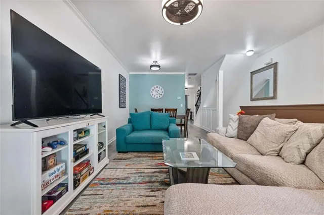 a bathroom with a sink toilet and a mirror