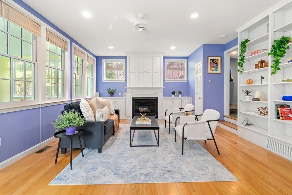 26 William Street Needham, MA 02494 - Photo 11 of 35 a living room with furniture fireplace and window
