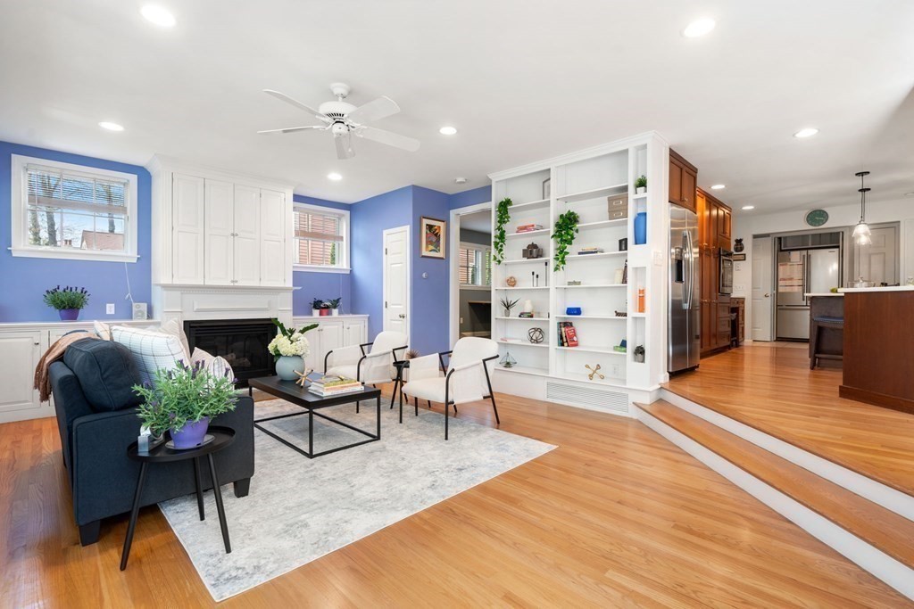 26 William Street Needham, MA 02494 - Photo 12 of 35 a living room with furniture and a fireplace