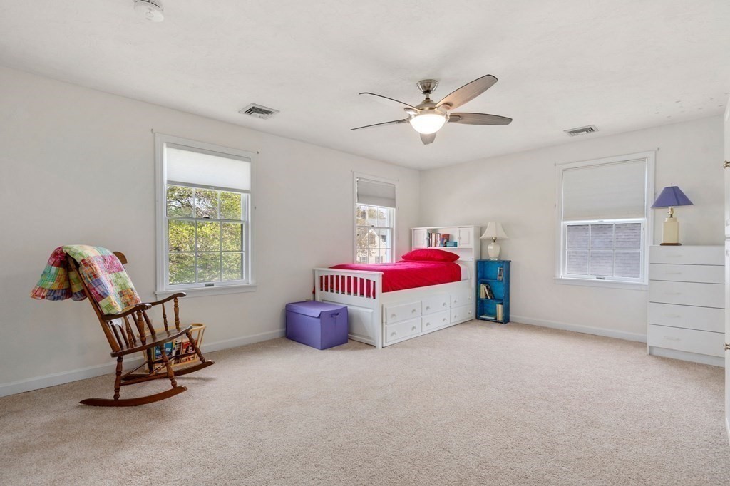 26 William Street Needham, MA 02494 - Photo 20 of 35 a bed room with a bed and a window