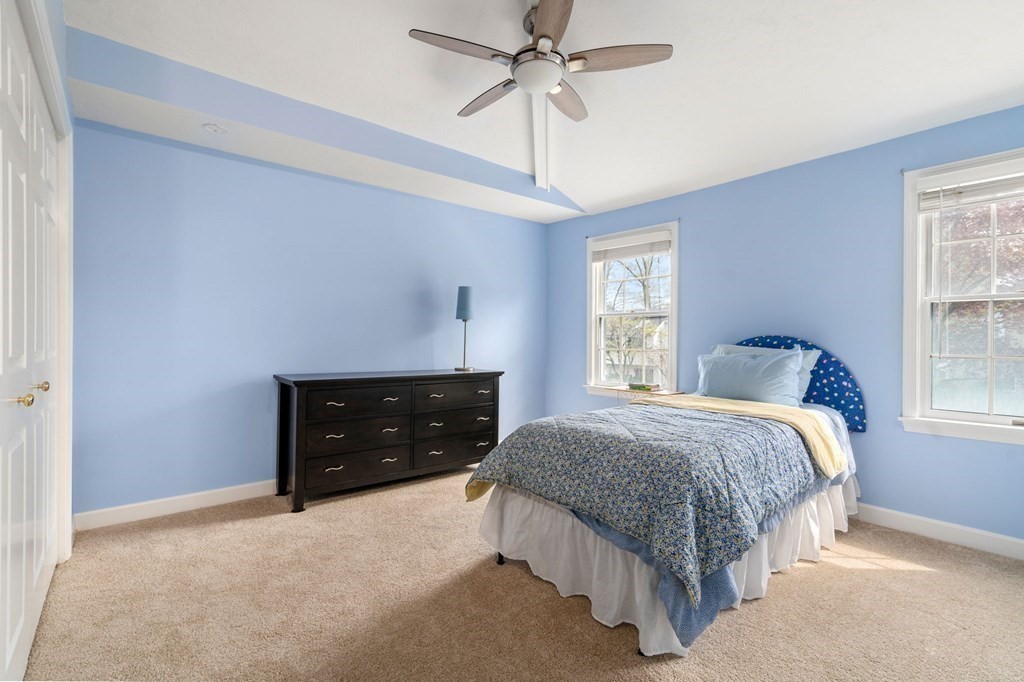 26 William Street Needham, MA 02494 - Photo 21 of 35 a bedroom with a bed and window