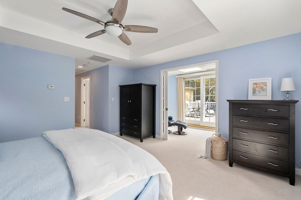 26 William Street Needham, MA 02494 - Photo 27 of 35 a bedroom with a bed and a dresser