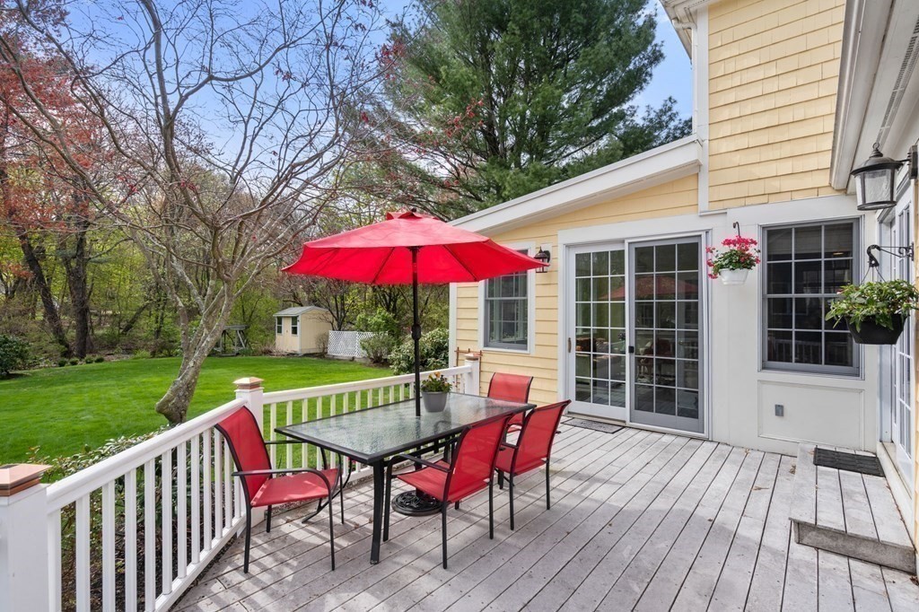 26 William Street Needham, MA 02494 - Photo 31 of 35 a view of a deck with furniture and a backyard
