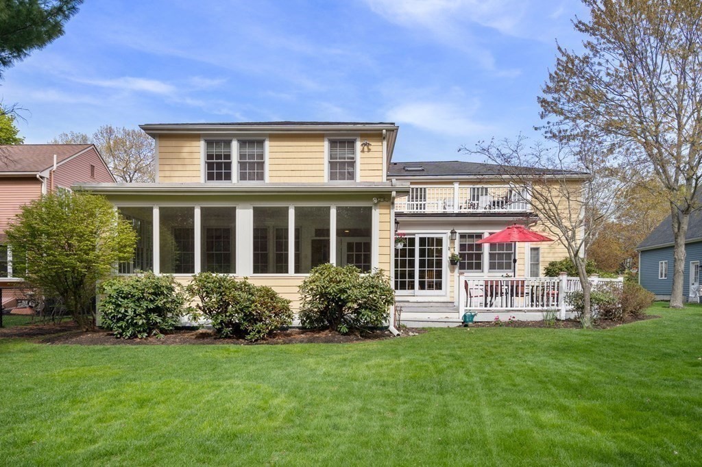 26 William Street Needham, MA 02494 - Photo 32 of 35 a front view of house with yard and green space