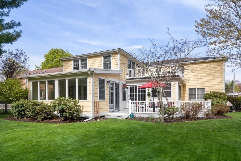 26 William Street Needham, MA 02494 - Photo 33 of 35 a front view of a house with a yard table and chairs