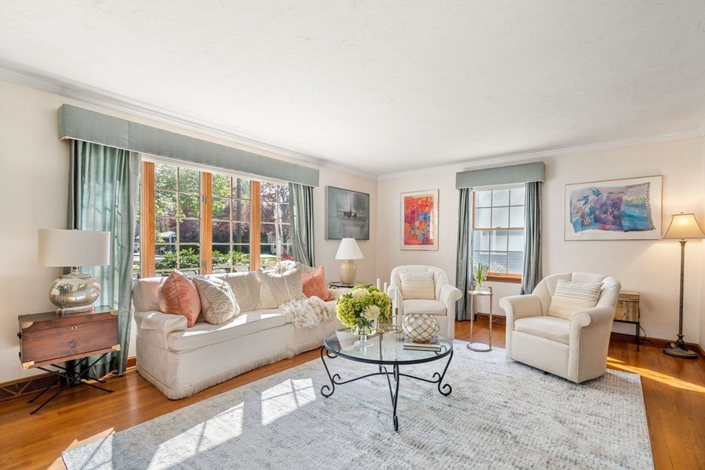 26 William Street Needham, MA 02494 - Photo 4 of 35 a living room with furniture and a large window