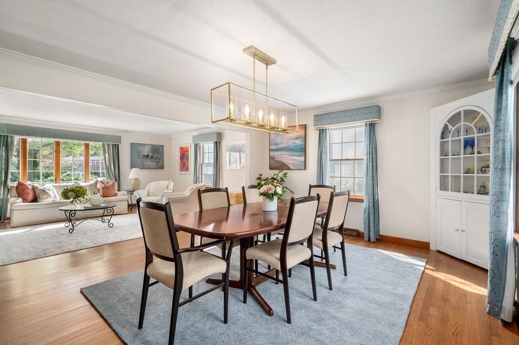 26 William Street Needham, MA 02494 - Photo 5 of 35 a view of a dining room with furniture window and wooden floor