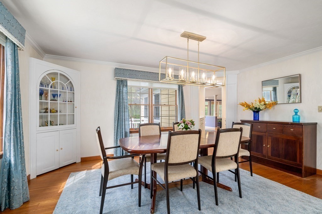 26 William Street Needham, MA 02494 - Photo 6 of 35 a view of a dining room with furniture window and wooden floor