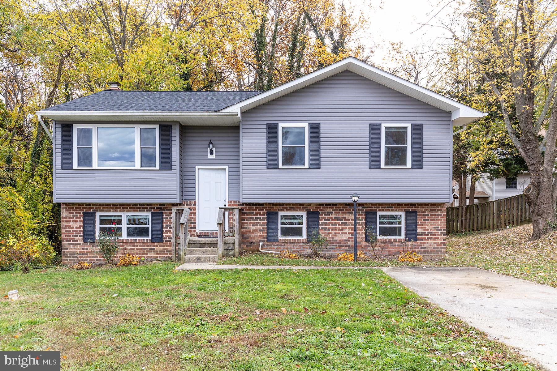 847 Harbor View Terrace Annapolis, MD 21409 - Photo 1 of 42 a front view of a house with a yard