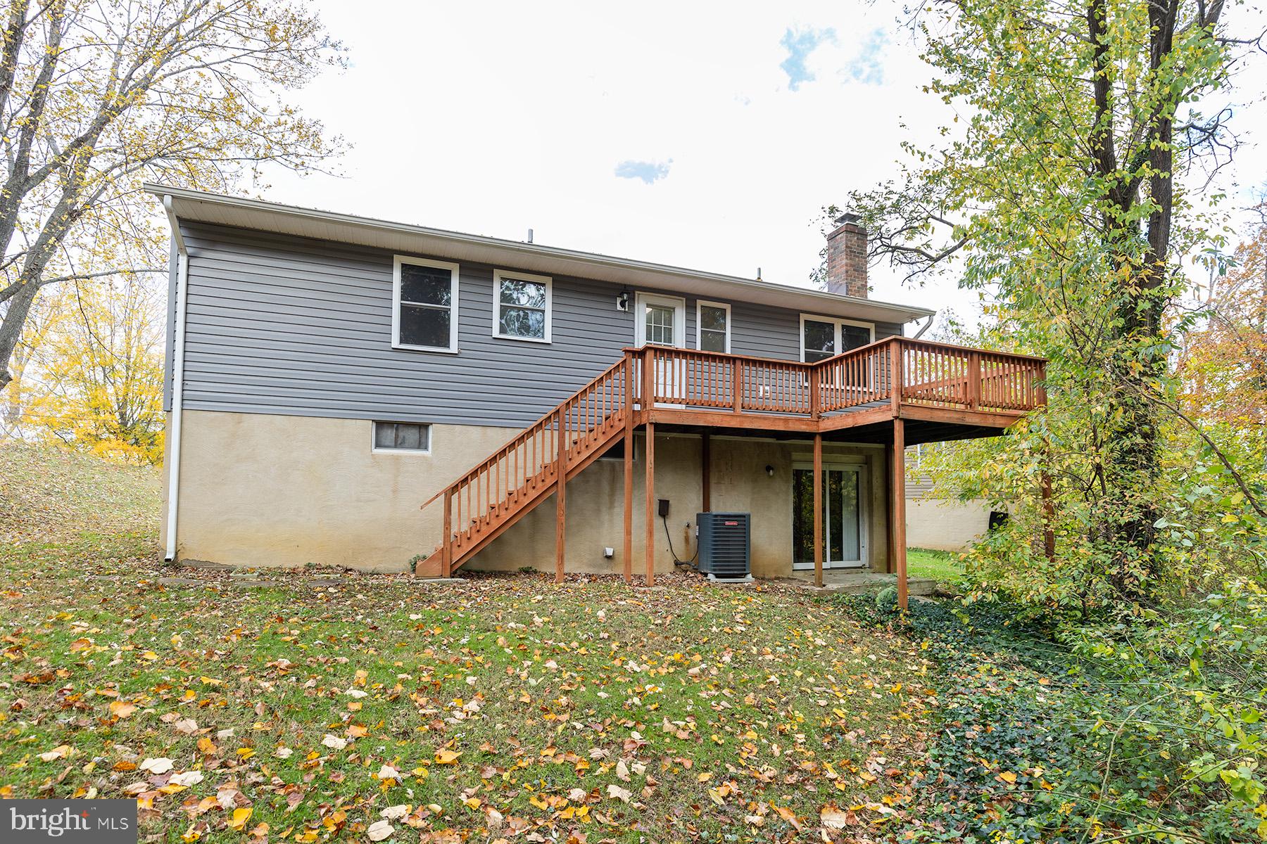 847 Harbor View Terrace Annapolis, MD 21409 - Photo 14 of 42 a front view of a house with a garden