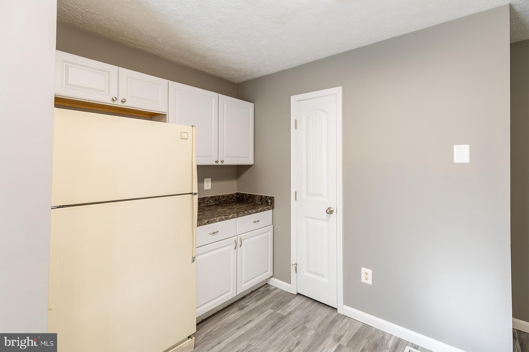 847 Harbor View Terrace Annapolis, MD 21409 - Photo 22 of 42 a white refrigerator freezer sitting inside of a kitchen