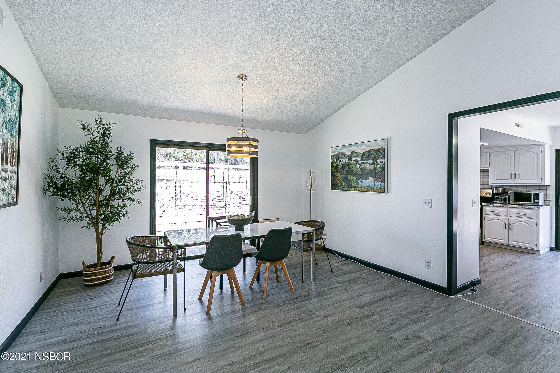 5375 Campbell Road Lompoc, CA 93436 - Photo 12 of 48 a view of a dining room with furniture and wooden floor