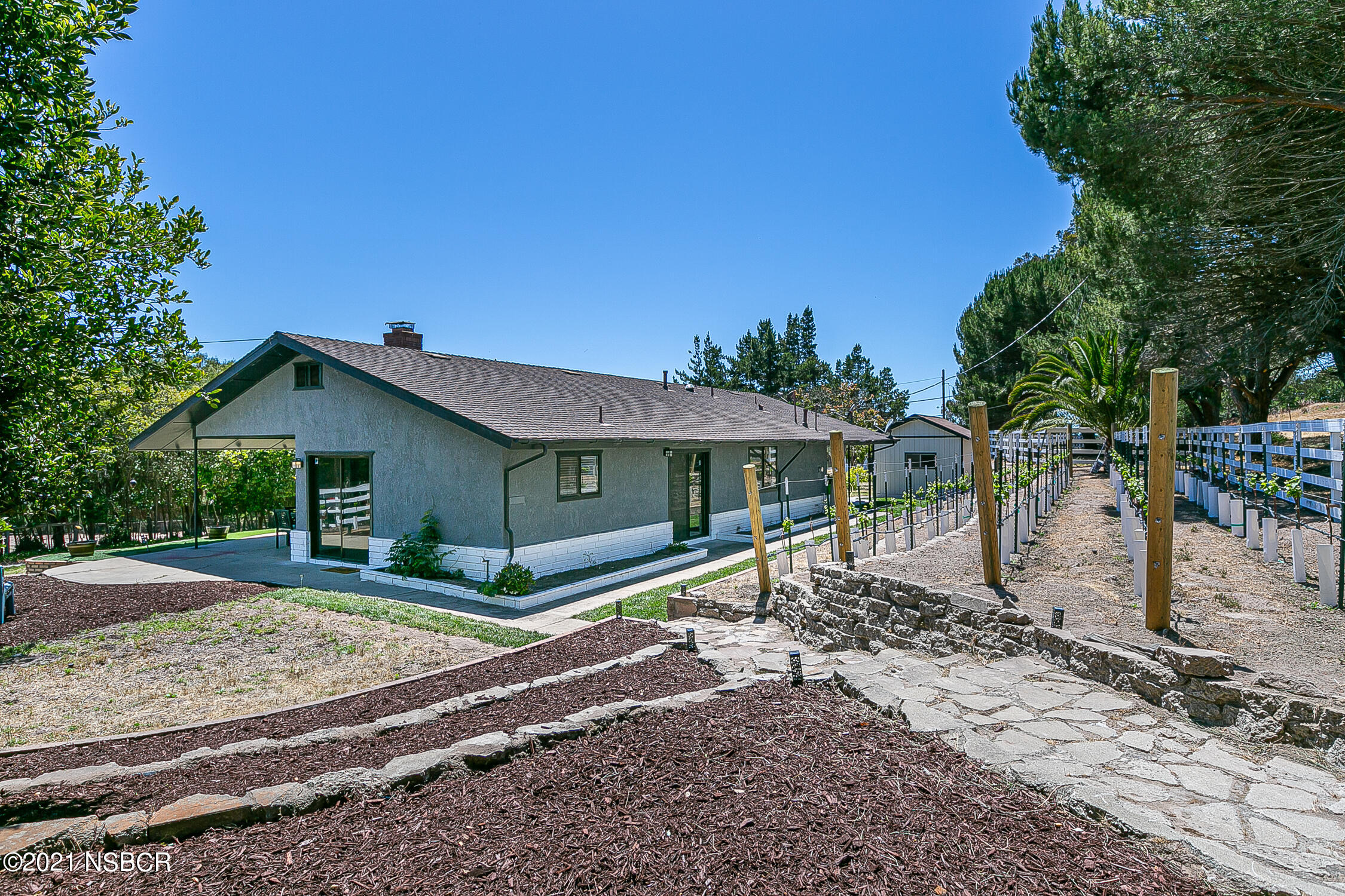 5375 Campbell Road Lompoc, CA 93436 - Photo 28 of 48 a front view of a house with garden