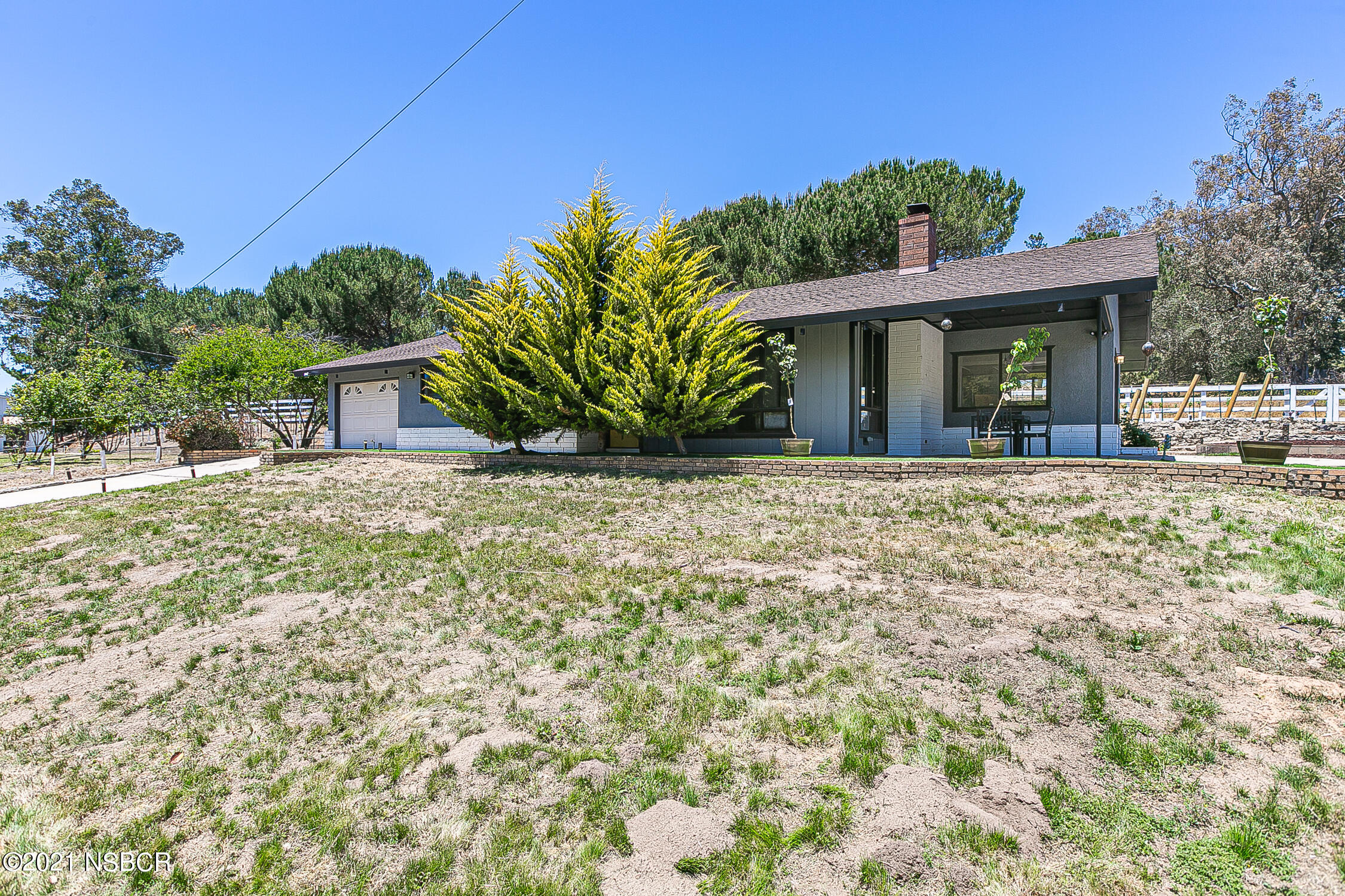 5375 Campbell Road Lompoc, CA 93436 - Photo 4 of 48 a front view of a house with a yard