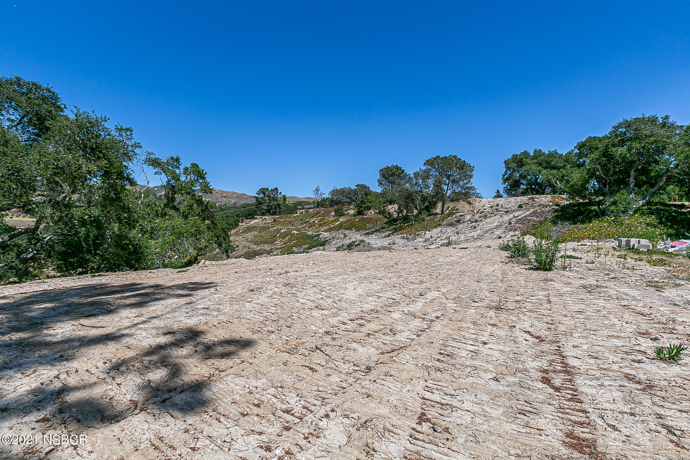 5375 Campbell Road Lompoc, CA 93436 - Photo 43 of 48 a view of a dirt road with trees in the background