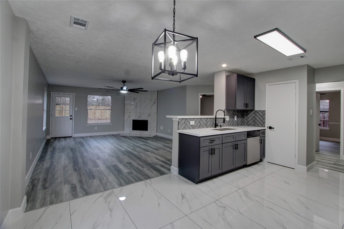 3646 Nutwood Lane Spring, TX 77389 - Photo 5 of 14 a kitchen with a stove a sink and a refrigerator