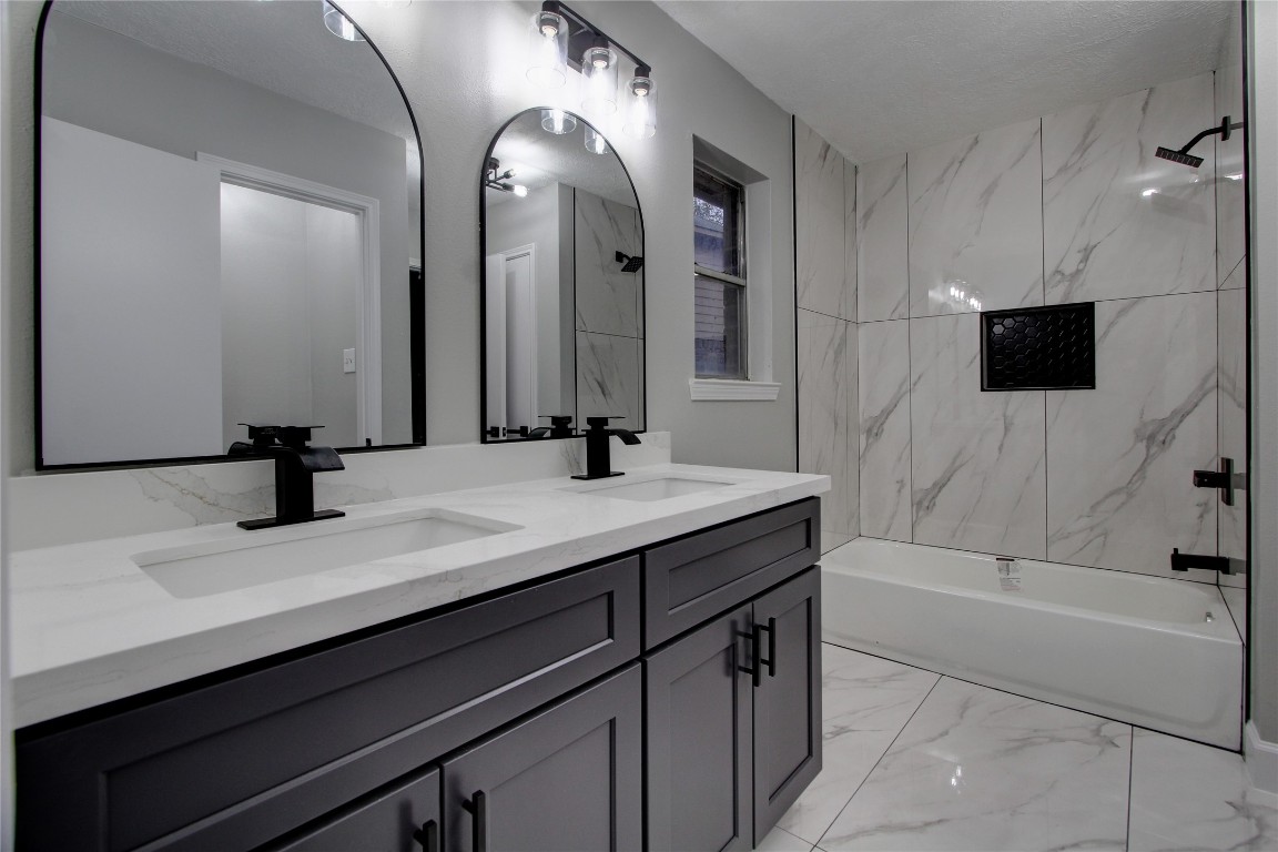 3646 Nutwood Lane Spring, TX 77389 - Photo 6 of 14 a bathroom with a tub sink and mirror