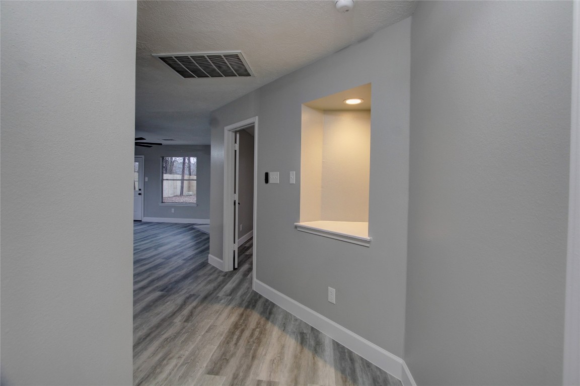 3646 Nutwood Lane Spring, TX 77389 - Photo 8 of 14 wooden floor in an empty room with a window