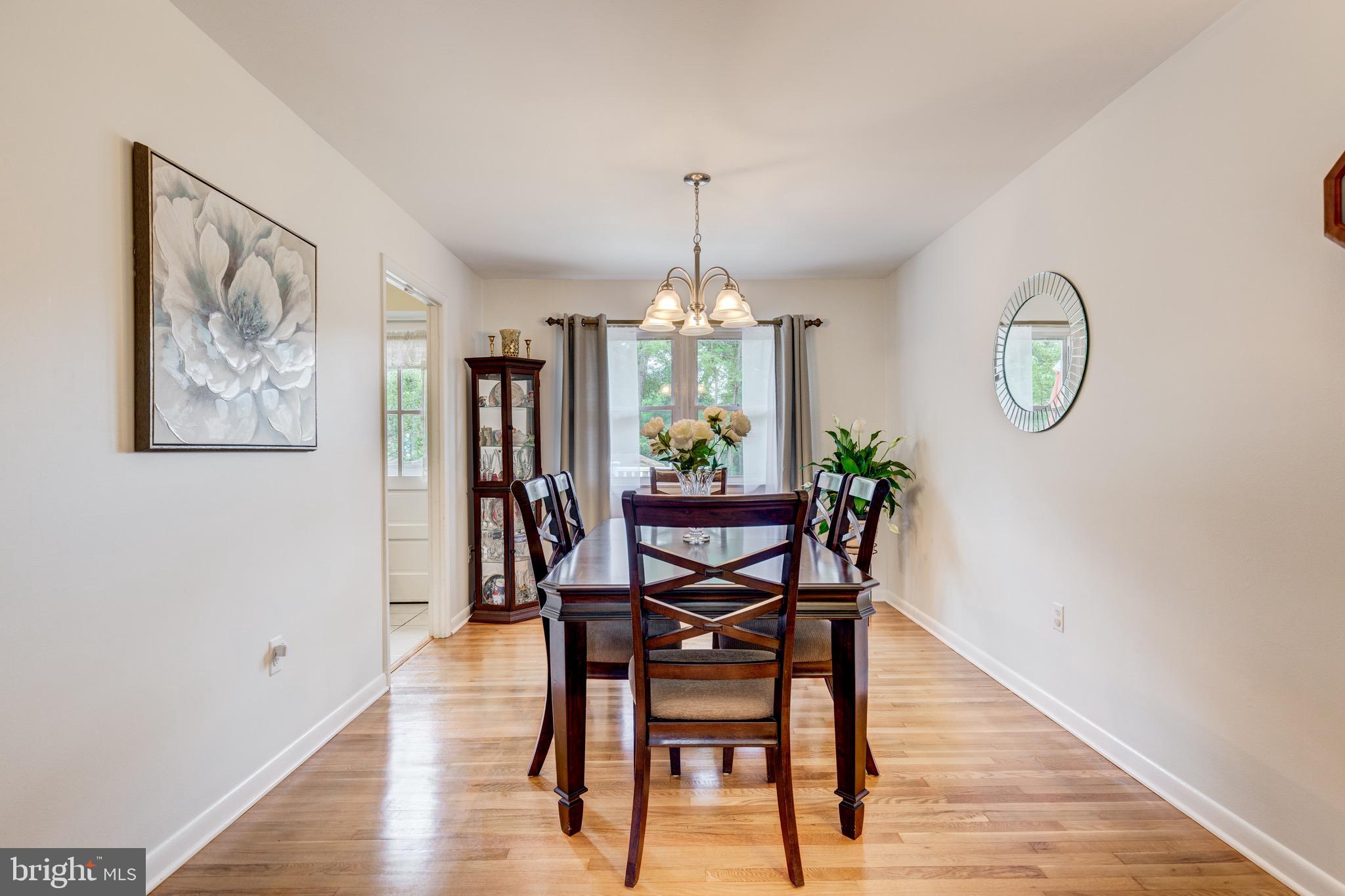 1578 Long Point Road Pasadena, MD 21122 - Photo 12 of 48 Dining Room Hardwood Floors