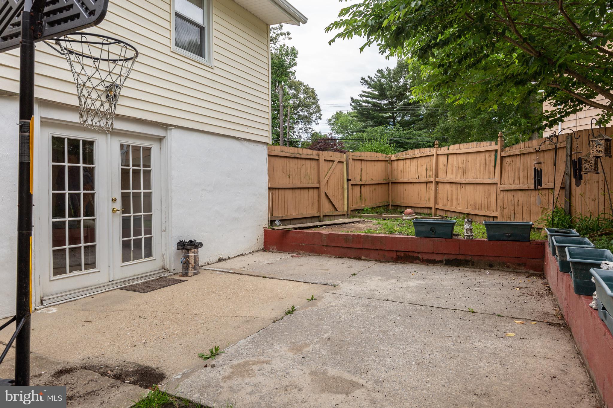 1578 Long Point Road Pasadena, MD 21122 - Photo 34 of 48 Concrete Patio outside the lower level