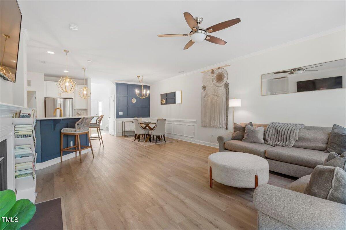 225 Mayfield Drive Apex, NC 27539 - Photo 19 of 41 a living room with furniture and kitchen view