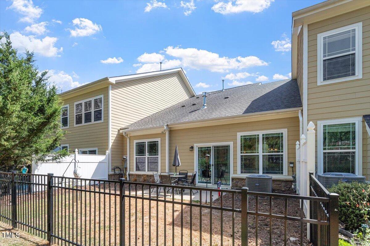 225 Mayfield Drive Apex, NC 27539 - Photo 34 of 41 a view of a house with a large window