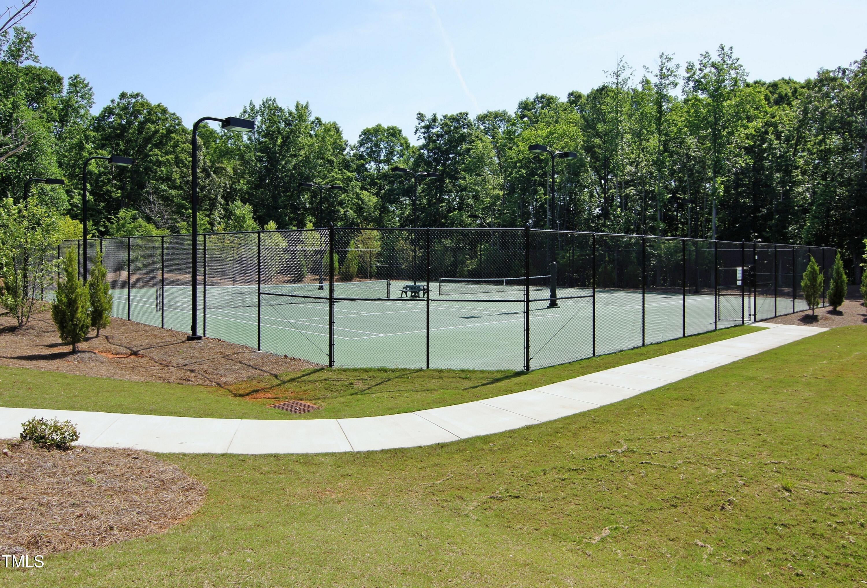 225 Mayfield Drive Apex, NC 27539 - Photo 38 of 41 a view of a backyard with entertaining space
