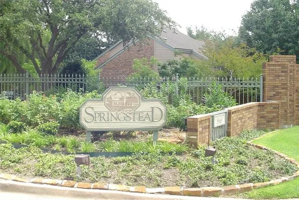 a view of outdoor space with garden and seating