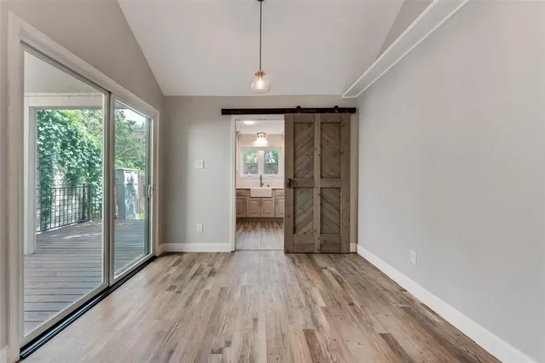 a view of entryway with wooden floor