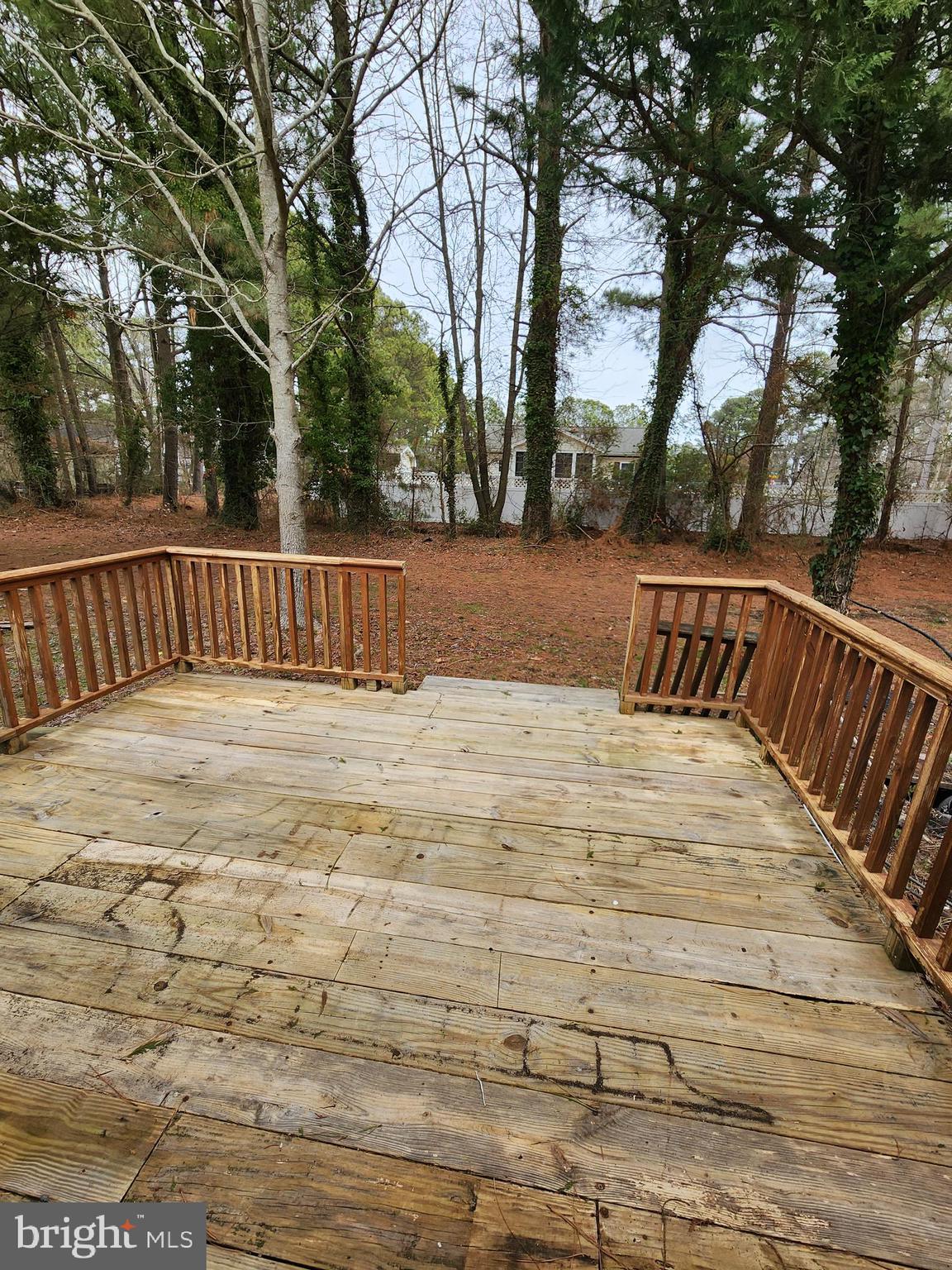 26552 Old State Road Crisfield, MD 21817 - Photo 9 of 26 Side deck off kitc hen