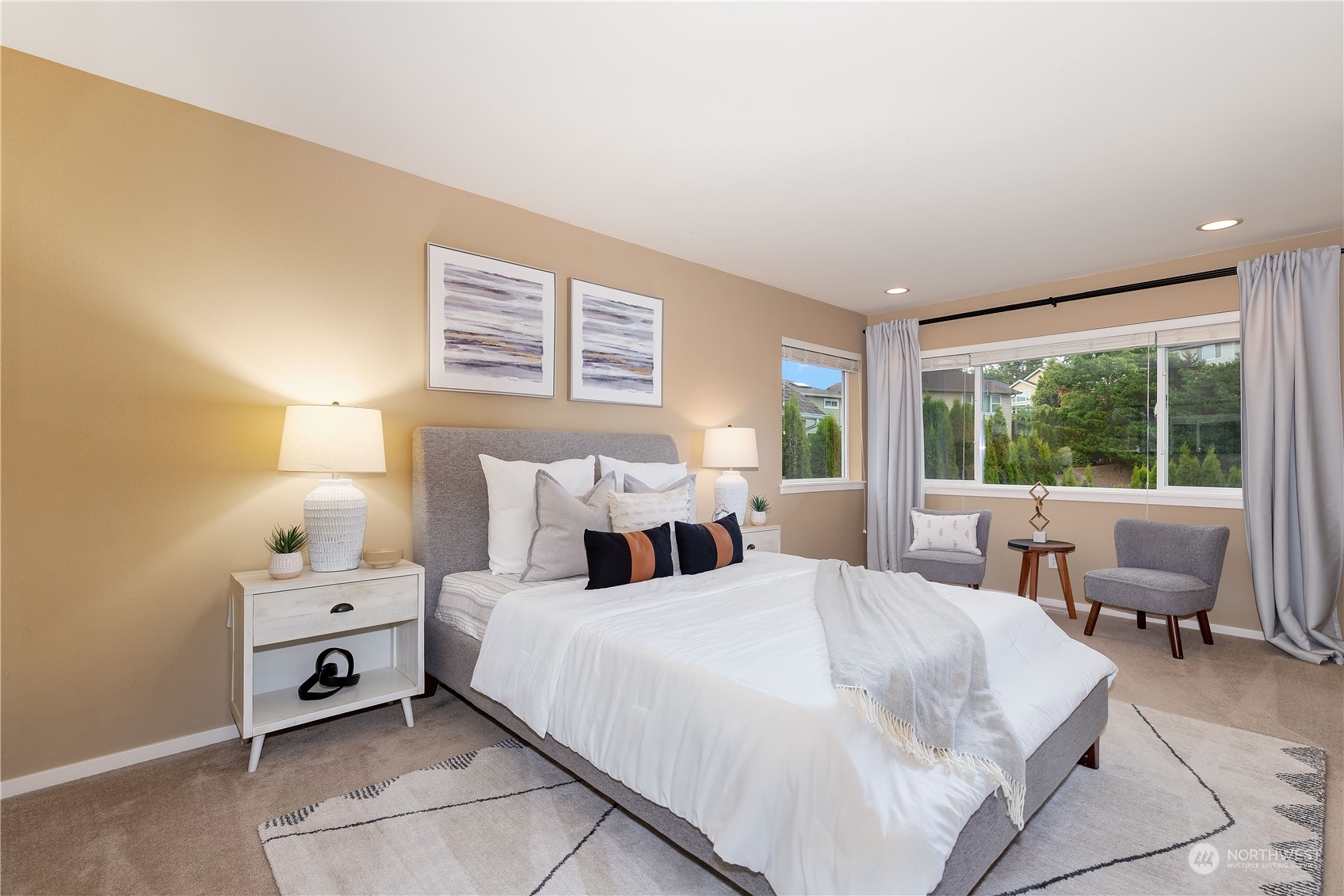 16722 166th Place Southeast Renton, WA 98058 - Photo 16 of 35 a bedroom with a bed and a large window