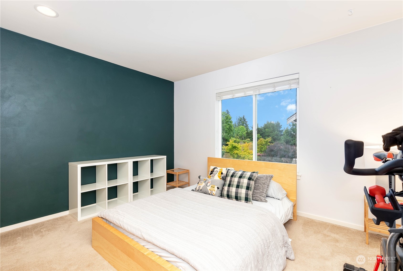 16722 166th Place Southeast Renton, WA 98058 - Photo 22 of 35 a bedroom with a bed and wooden floor