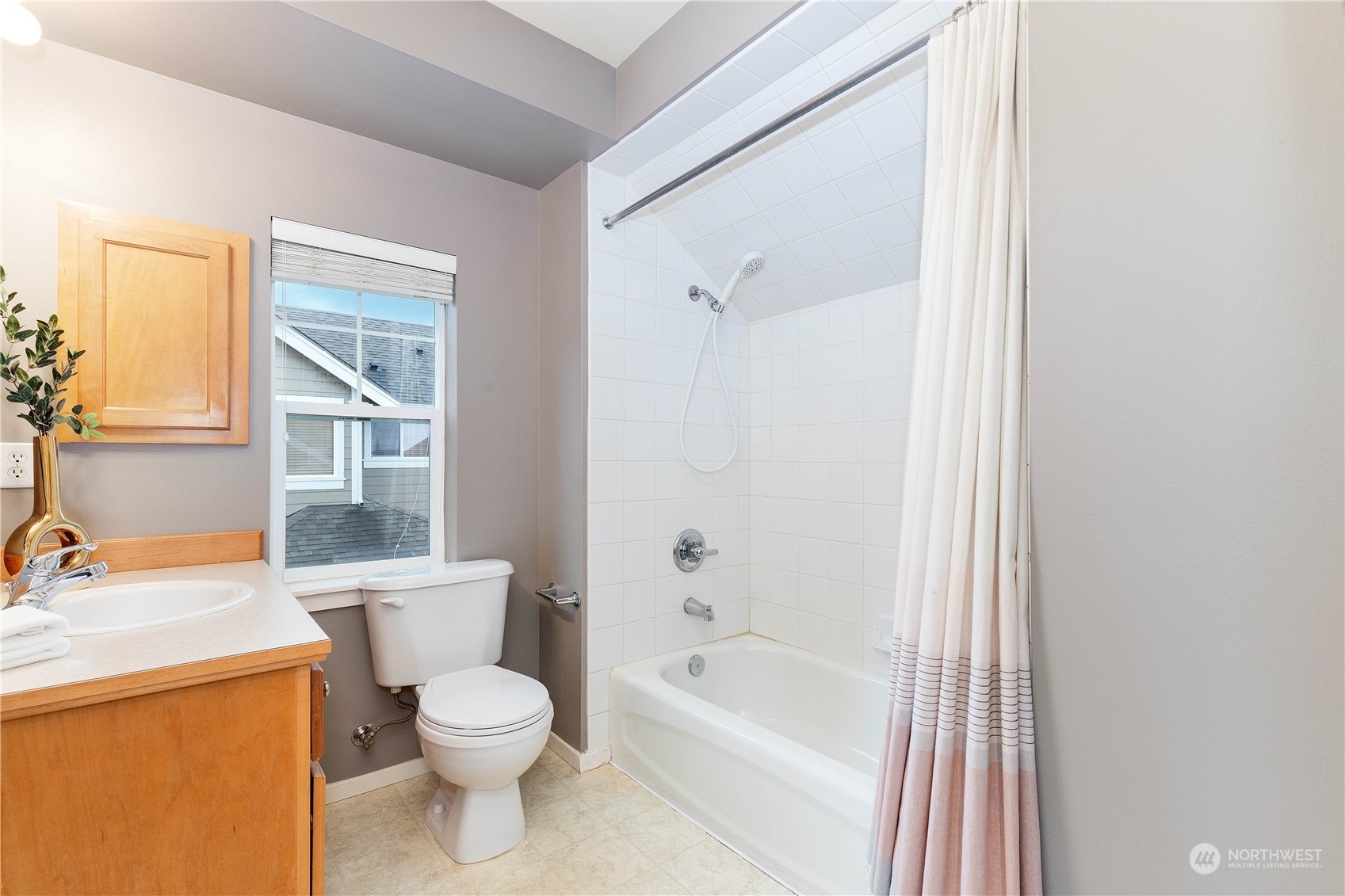 16722 166th Place Southeast Renton, WA 98058 - Photo 24 of 35 a bathroom with a toilet a sink and a bathtub