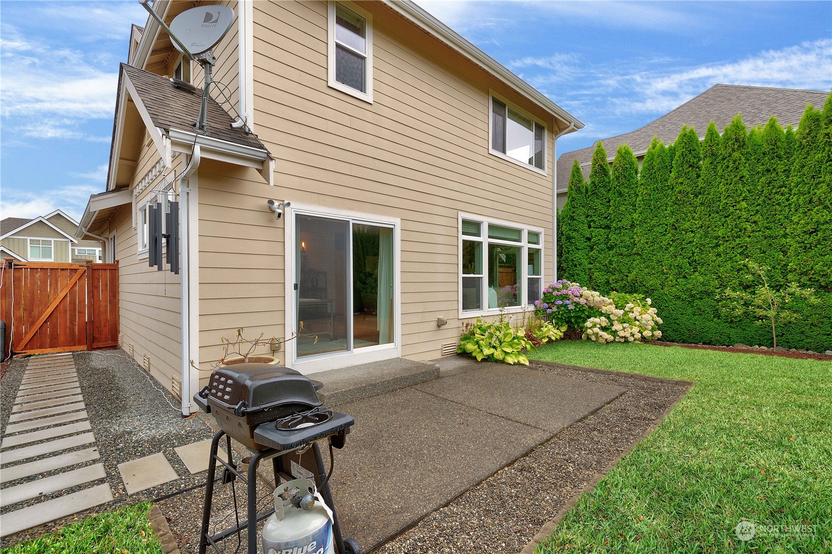 16722 166th Place Southeast Renton, WA 98058 - Photo 32 of 35 a view of a house with backyard and sitting area