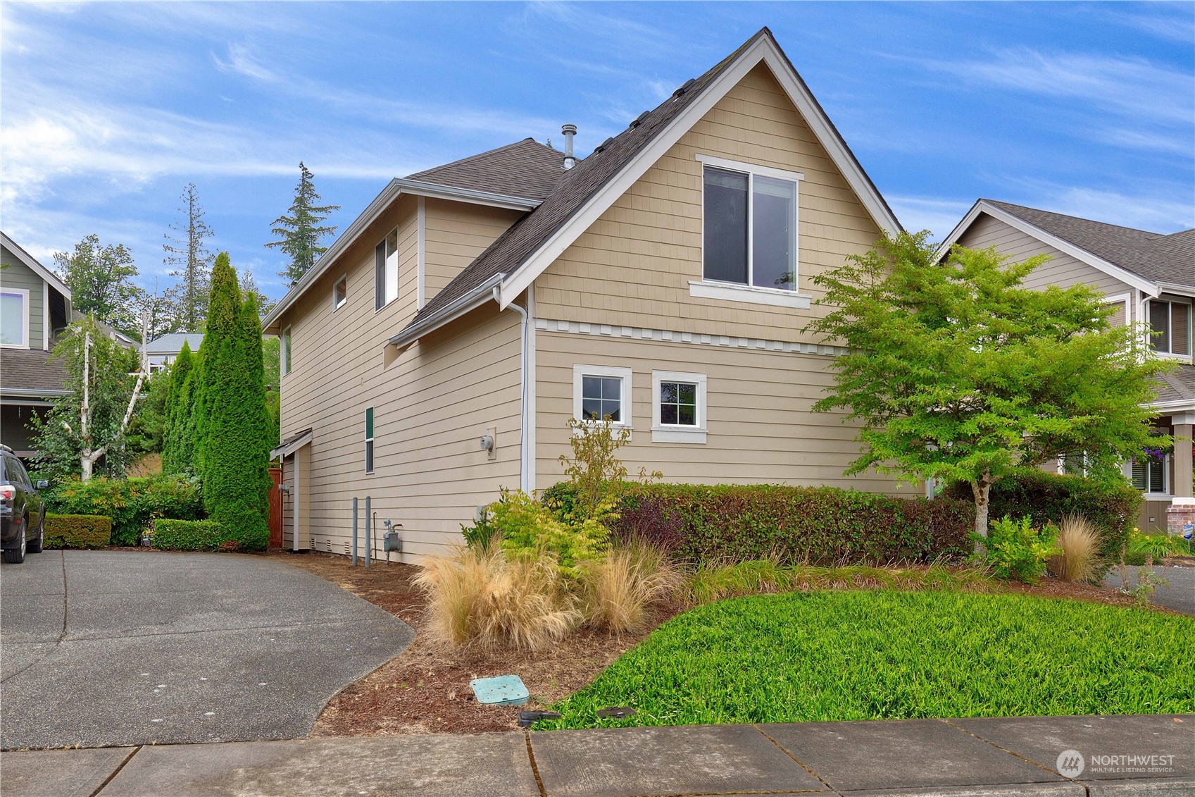 16722 166th Place Southeast Renton, WA 98058 - Photo 34 of 35 a front view of a house with garden