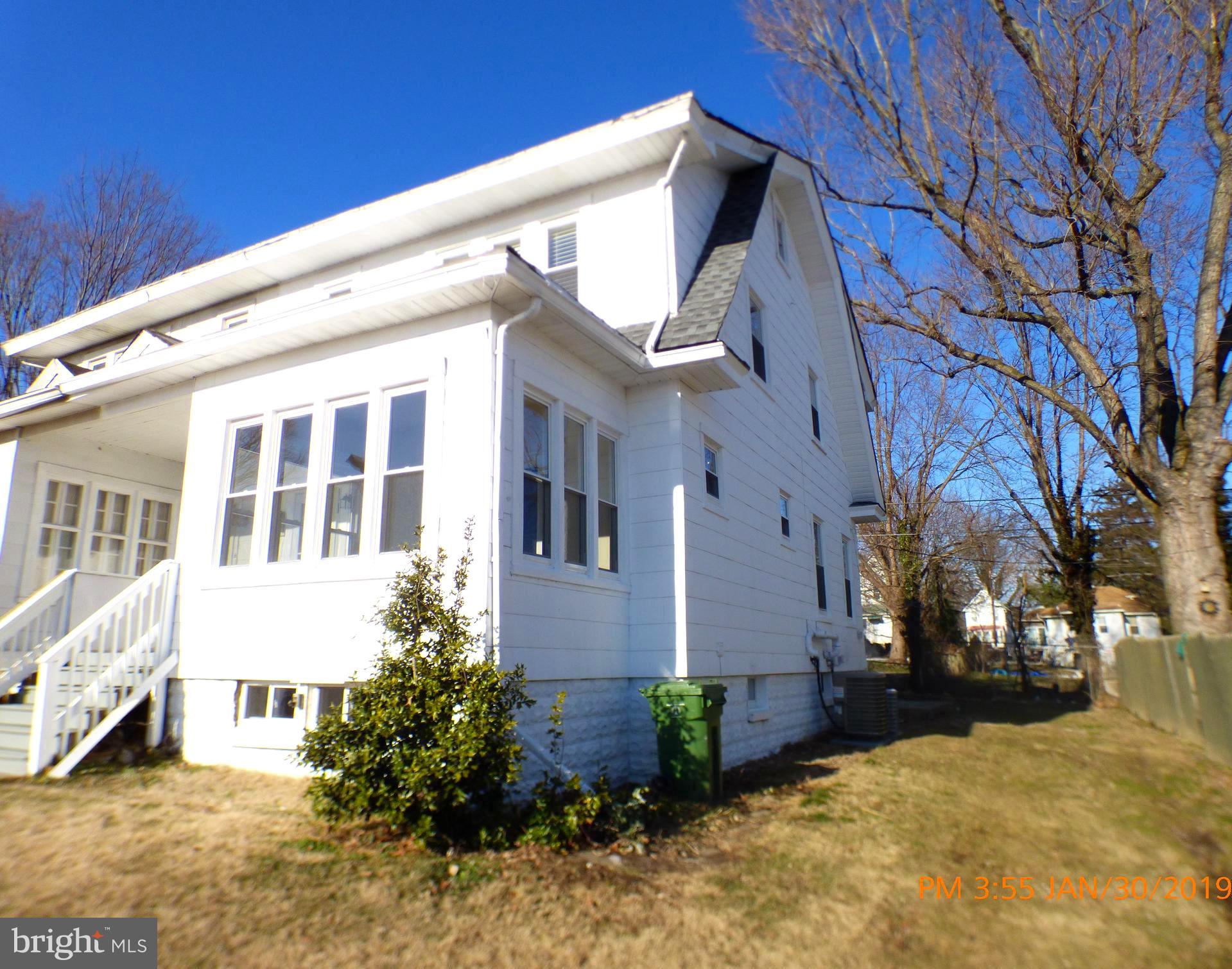 3102 Cedarhurst Road Baltimore, MD 21214 - Photo 21 of 42 a view of a building with a yard