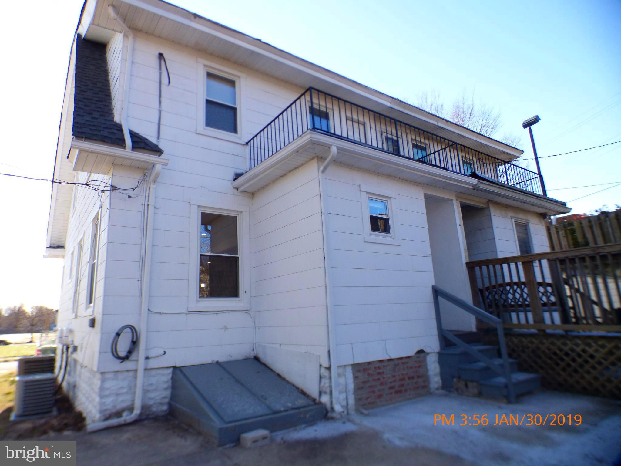 3102 Cedarhurst Road Baltimore, MD 21214 - Photo 25 of 42 a front view of a house with balcony