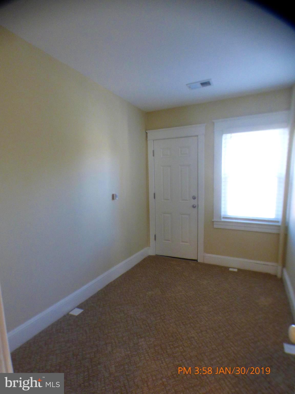 3102 Cedarhurst Road Baltimore, MD 21214 - Photo 29 of 42 an empty room with a window
