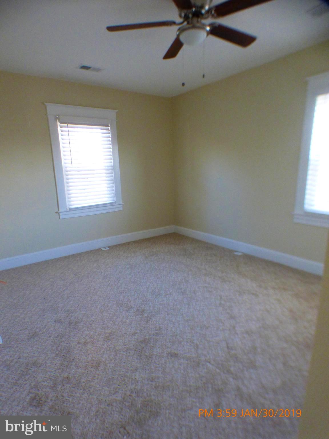3102 Cedarhurst Road Baltimore, MD 21214 - Photo 30 of 42 an empty room with a window