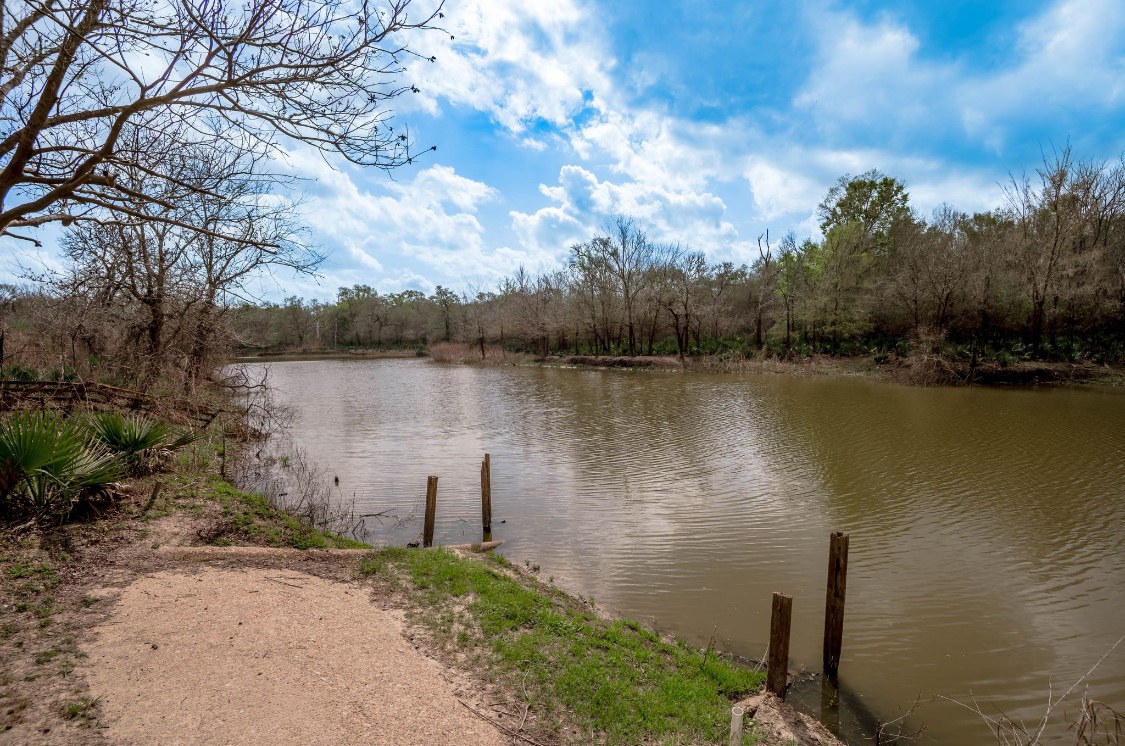 Lot 1-and Harper Branch Road Trinity, TX 75862 - Photo 13 of 21 a view of a lake with houses in the back