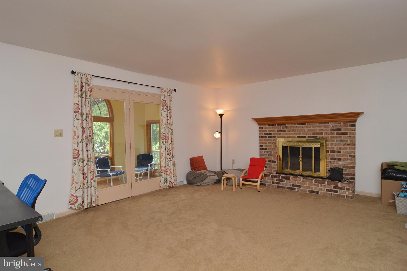 56 Rim View Lane Reading, PA 19607 - Photo 20 of 43 Family Room Has a Wood Burning Fireplace