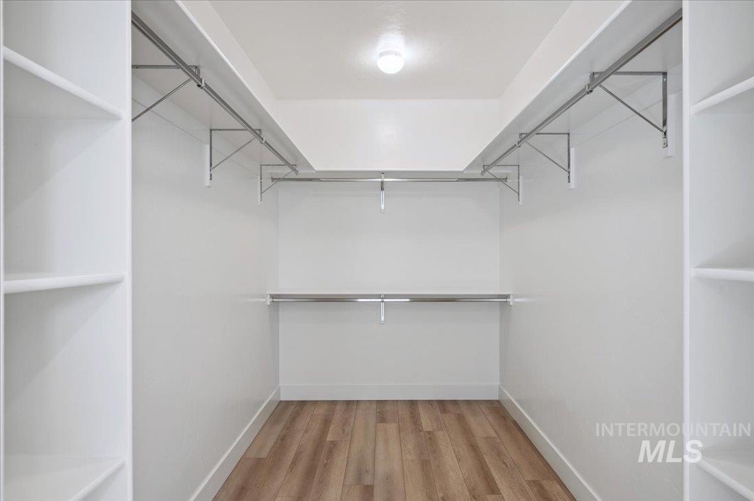 6271 West Snow Currant Street Meridian, ID 83646 - Photo 14 of 14 Walk in closet with light wood-style flooring