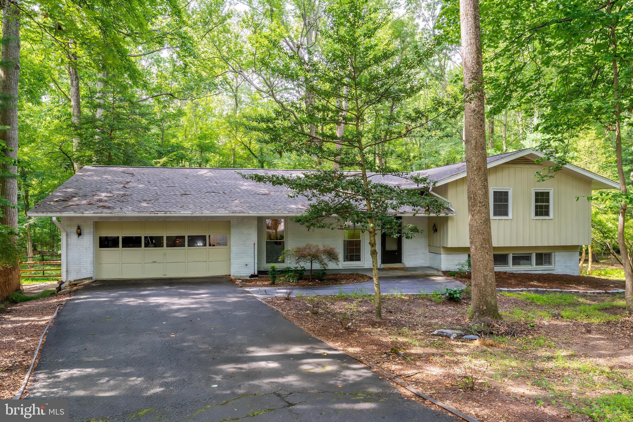 11621 Sourwood Lane Reston, VA 20191 - Photo 1 of 26 a house view with a outdoor space