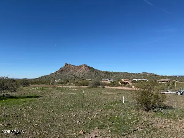 a view of lake with mountain