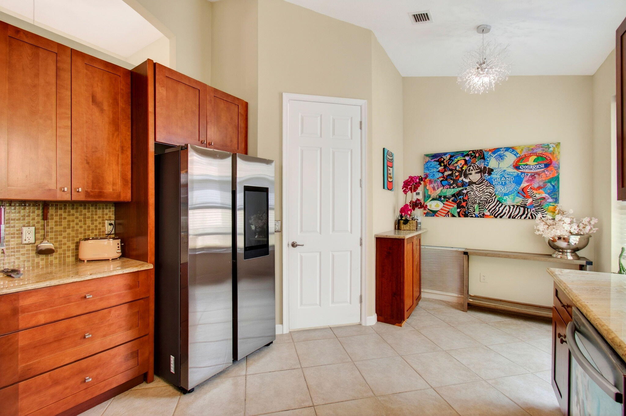 6737 Southport Drive Boynton Beach, FL 33472 - Photo 38 of 99 a kitchen with stainless steel appliances a refrigerator and a sink