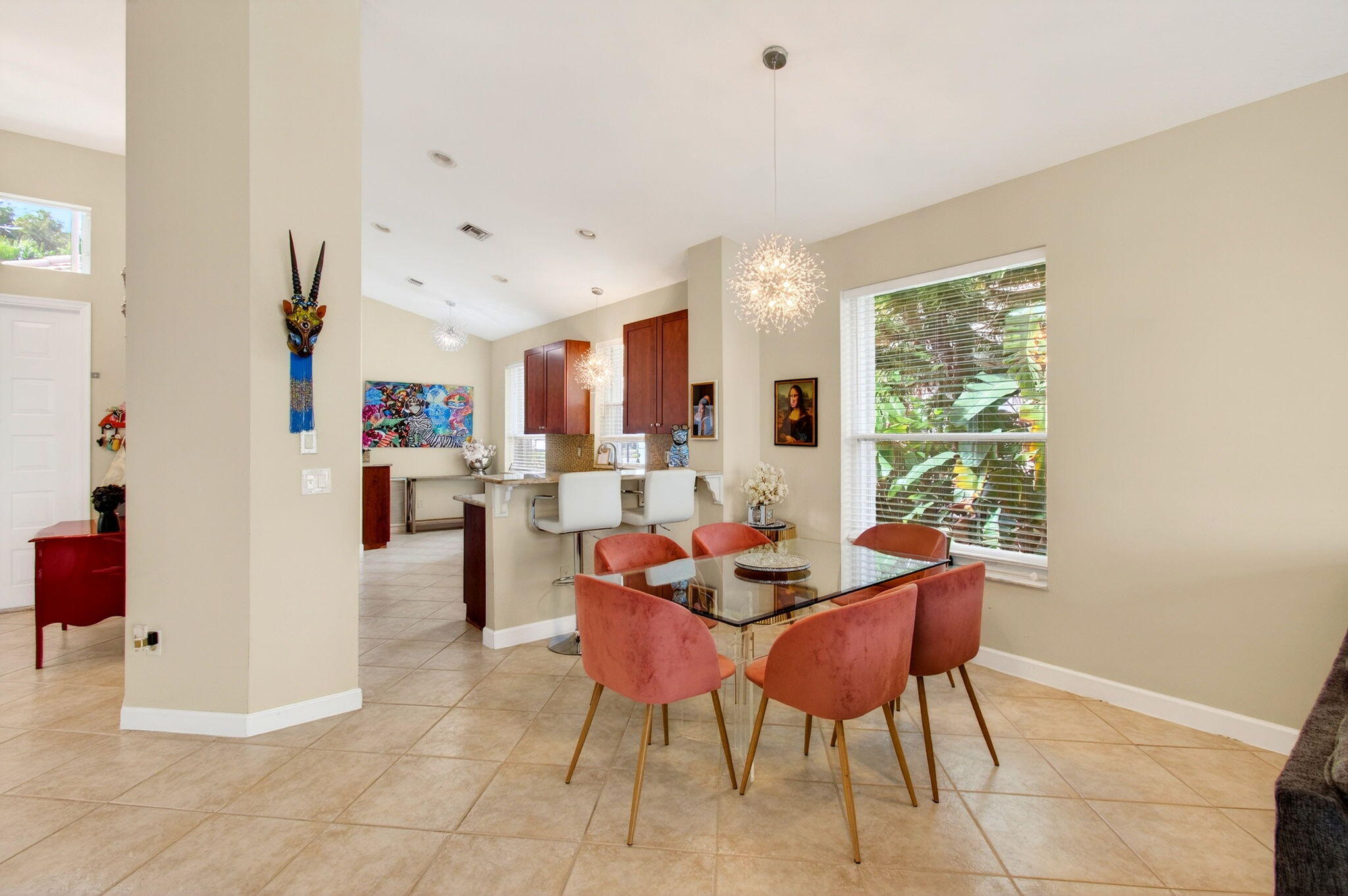 6737 Southport Drive Boynton Beach, FL 33472 - Photo 7 of 99 a dining room with furniture and a window